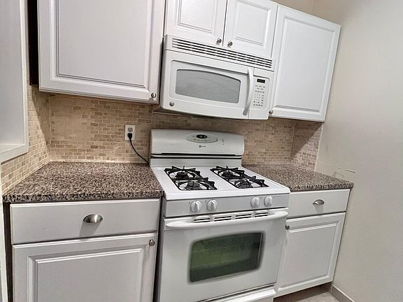 Renovated kitchen with granite countertops