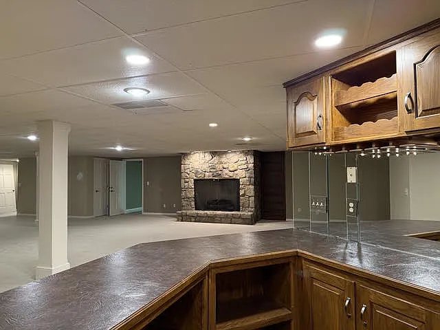 Familyroom with fireplace and mini kitchen wet bar (includes full bath)