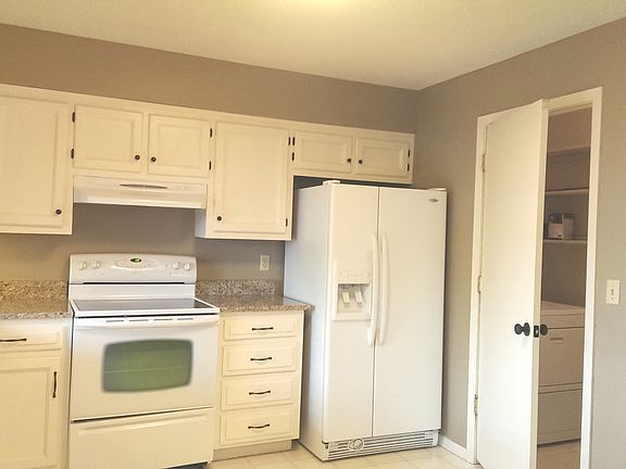 kitchen with granite counter & laundry Rm