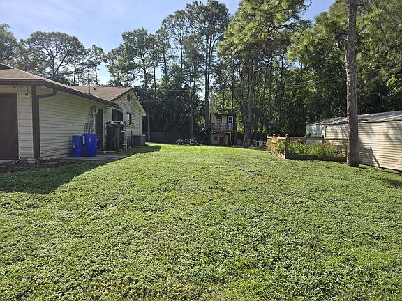 West side of home with your own personal fresh garden to grow your own foods