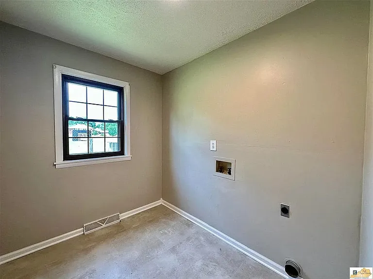 Main floor laundry, perfect for convenience and saving time Plus, check out the natural light from the window! #rentalproperty #mainfloorlaundry
