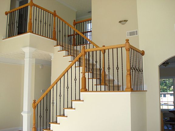 Dramatic staircase accents the large family room.