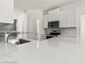209 SE 26th Ter — Photo 21