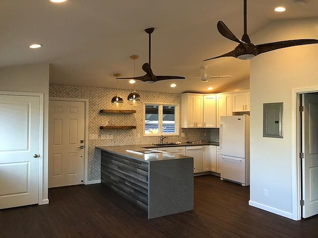 view to kitchen and front door