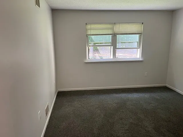 Bedroom 1 with separate enclosed full bathroom