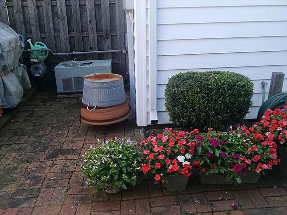 Patio and attached storage shed