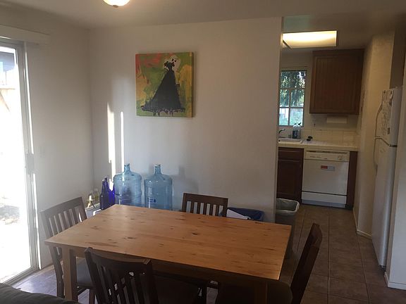 Dining room and kitchen entrance on right, viewed from LR