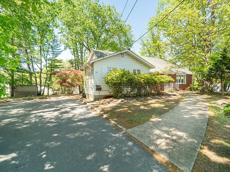 west side driveway with parking for 4 cars