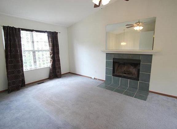 Vaulted Family Room with wood-burning fireplace!