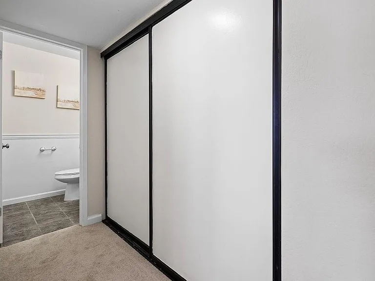 hallway 9 ft closet for plenty of storage and half bath