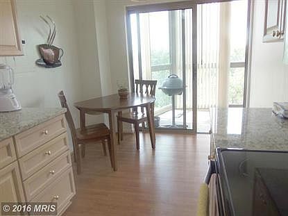 Kitchen access to three-season balcony