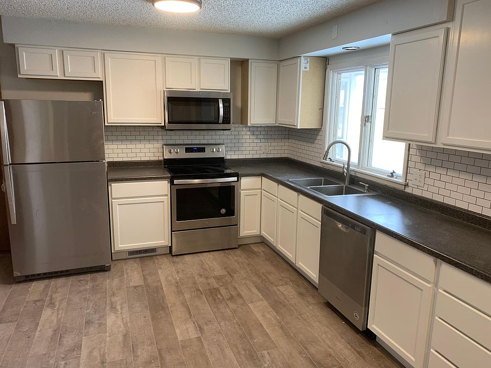 Brand new kitchen with new stainless steel appliances.
