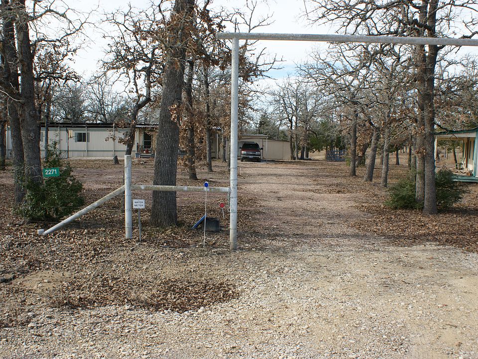 Driveway off paved road.