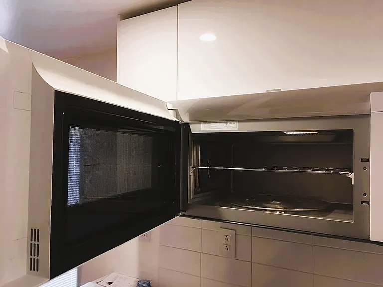 Microwave, fan, light and oven combination