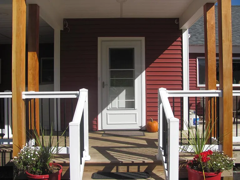 The rear steps to the main entry