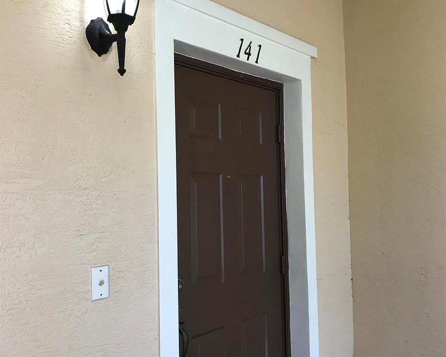 1st image of 141 E Thatch Palm Cir