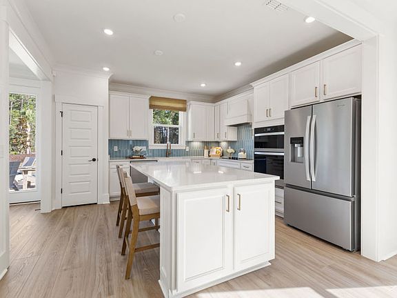 Beautiful Kitchen, that connects to the dining room space for easy access.