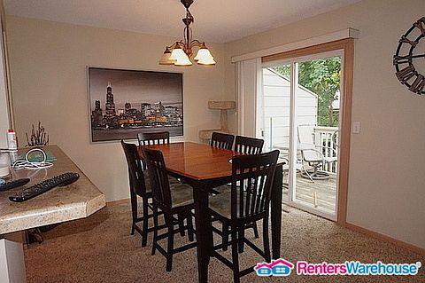 5th image of 7916 Beard Ave N