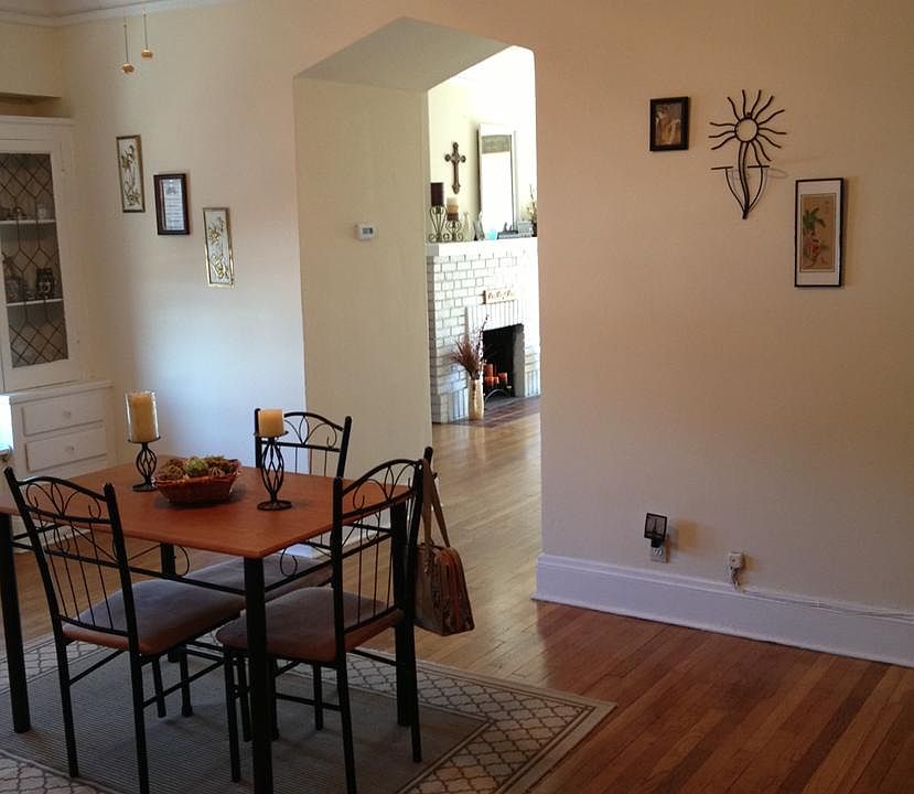 Bright rooms with charming open arch between Living Rm and Dining Rm