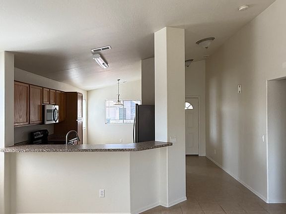Living room looking through the kitchen into the dining room
