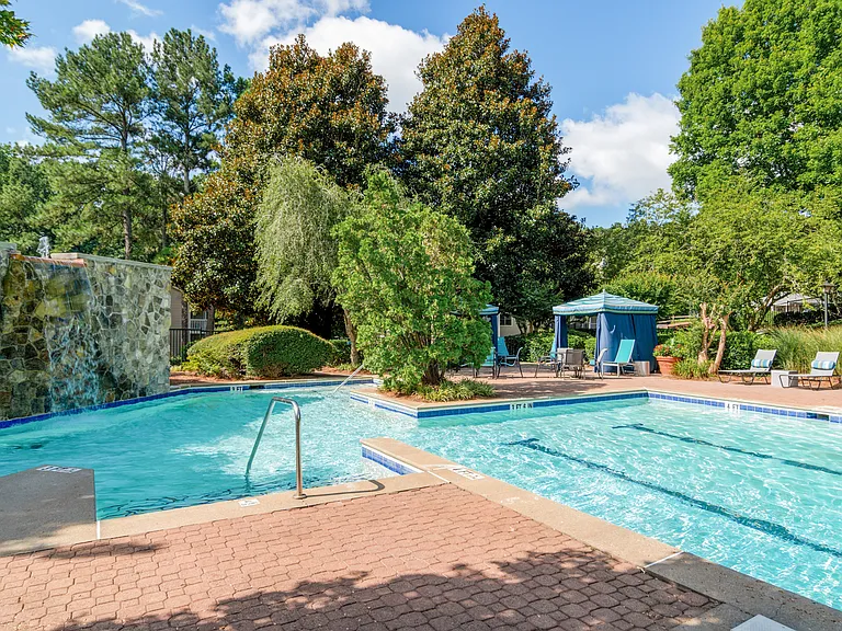 Refreshing Swimming Pool Area with Water Features