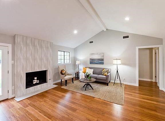 Vaulted ceilings with lots of natural light show off these great Bamboo floors!