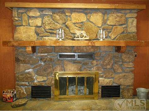 Woodburning rock fireplace