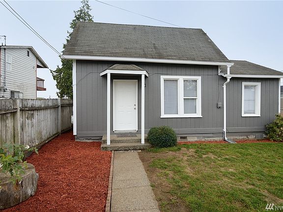 Sweet farmhouse and duplex make up this Tri-plex property. This picture was taken before the roof was replaced in June.