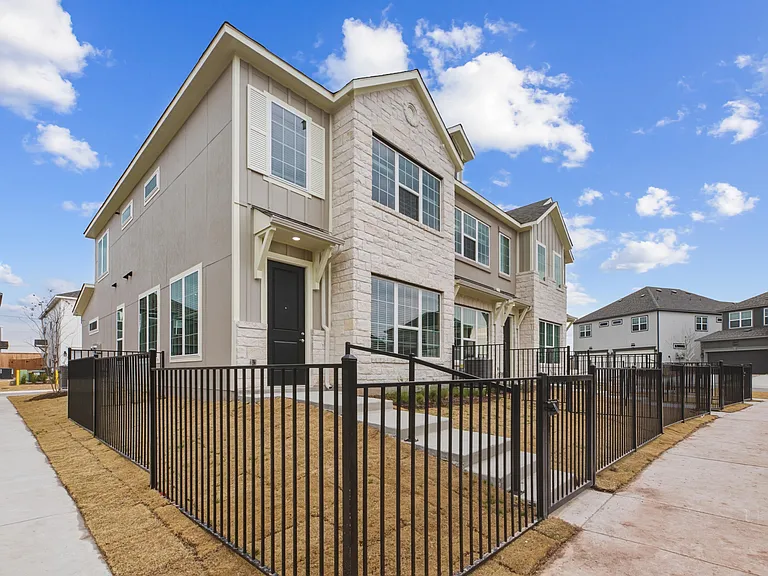Townhome Exterior with Fenced Yard (Plan 3191)