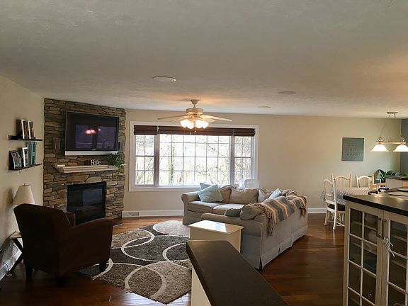 Stone wall w/ fireplace