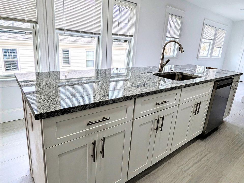 center island with dishwasher and sink