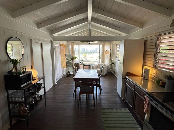 kitchen and dining area, open floor design, leading to the living area