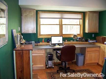 Den/Office
						:
						Also downstairs. Features in-floor heat and a tile floor.