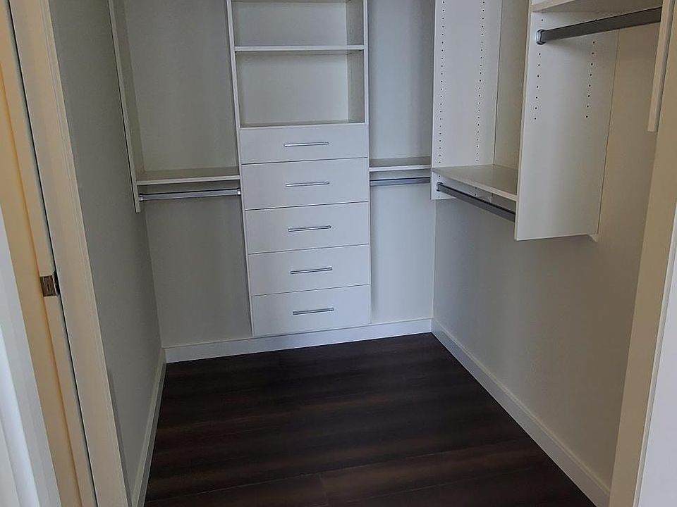 All closets have California Closet and hardwood floor upgrade.