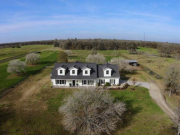 This "bird's-eye" view provides a look at the entire property that stretches all the way to Bessie's Creek in the back.  Notice that the property is fenced and cross fenced