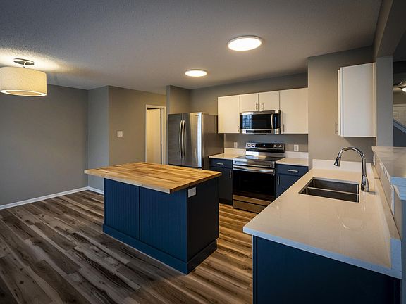 Kitchen with 1/2 bath entry.