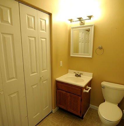 Half bathroom with laundry closet