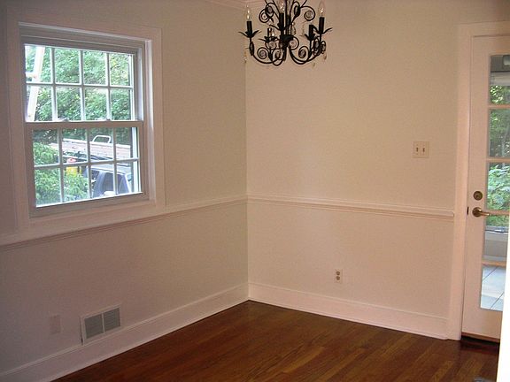Dining Room - refinished hardwood floors, crown moulding, chandelier