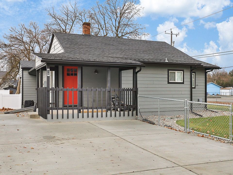 Private porch and paved driveway.