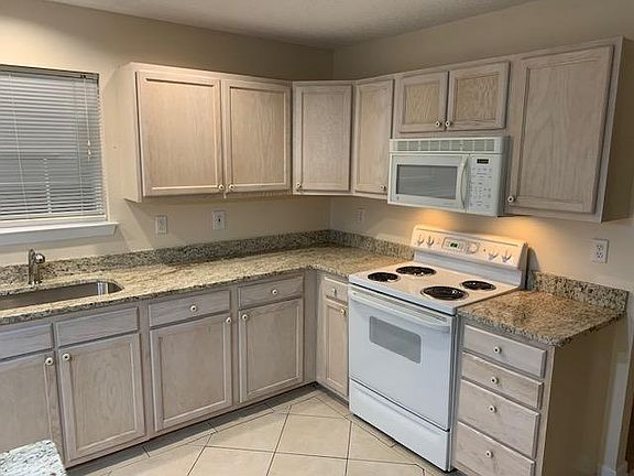 Kitchen with granite countertops
