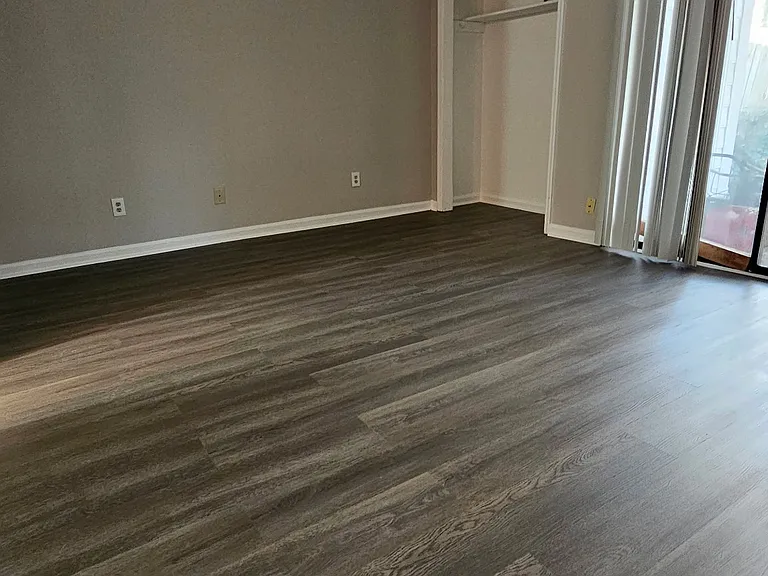 2nd bedroom with shared bathroom in hallway.