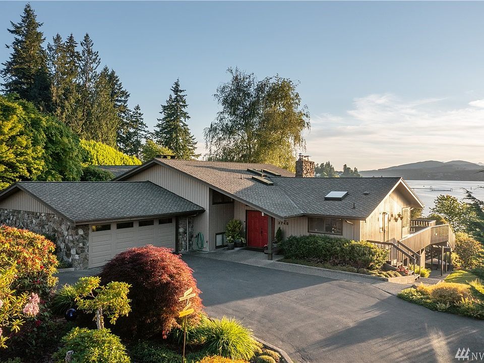  Classic North West home with expansive Sound and Olympic mountain views.
