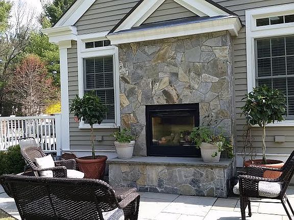 Backyard glass fireplace
