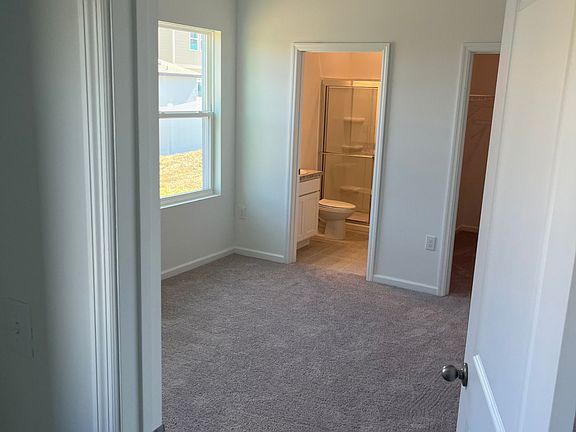 Master bedroom has two window and a walk in closet, an onsuite bathroom with a shower