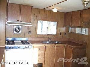Kitchen  facing the Front Driveway