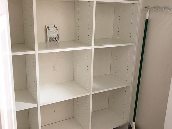 Spacious closet (second door on right of walkway)
