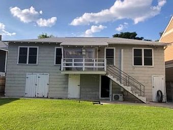 Rear building at 205 - 209 E. Courtland, 209 E. Courtland Unit 102 is above storage/garage units