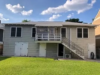 Rear building at 205 - 209 E. Courtland, 209 E. Courtland Unit 102 is above storage/garage units