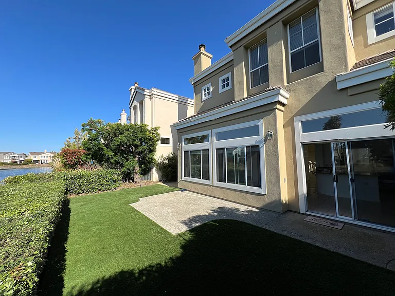 View of the home, backyard and waterview