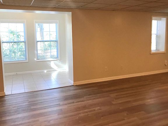 Living Room with brand new foors, Foyer